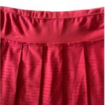 Nike Super cute pink pleated active skirt, excellent condition, size small Measurements: Waist: side to side 14-18 inches Length: waistband to bottom 15 1/2 inches Photo 4
