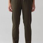 Lululemon  On The Fly Dark Olive Straight Leg Athletic Pants 4 Photo 0
