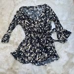 Free People All the Right Ruffles Romper in Raven Combo Button Back 3/4 … Photo 4