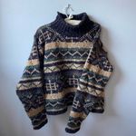Vintage 80s turtleneck grunge sweater with a unique, worn Photo 1