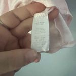 Caution to the Wind  Pink top with white stars Ruffle sleeves size large Photo 3