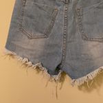 Machine ripped high rise Jean shorts Size 30 Photo 3