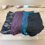 Athleta  lot of 4 women’s‎ shorts  size large Photo 1