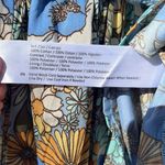 B.O.G Collection SizeM Color Blue Knitted dress upper the lower half has flowers Size undefined Photo 7