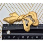 Monet  Signed Brooch Pin Brushed Gold Tone Elegant Graceful Ribbon 3" Stunning Photo 4