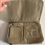 Baggallini LIGHT OLIVE GREEN SHOULDER BAG WITH SNAP FLIP CLOSURE
LOTS OF POCKETS Photo 1