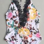 One piece sexy bathing suit xl plunging never worn Photo 3