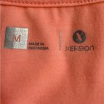 Xersion Version Neon Apricot Cover. Ties at hemline. Size M Photo 5