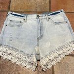 Free People lace trim denim shorts size 28 Photo 0