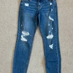 Old Navy  mid rise rockstar super skinny distressed blue jeans in size 2 Photo 0