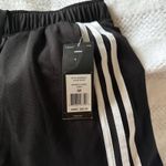Adidas NWT  3 stripe skort size medium Photo 1