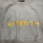 Kittenish crop sweatshirt, size medium, NWOT, pit to pit measures 17, length is 15 Photo 1
