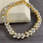 Crystal Gold Tone Tennis Bracelet Photo 0