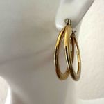 Gold tone double hoop earrings Photo 1