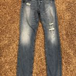 EXPRESS Skinny Mid Rise Distressed Jeans Photo 0