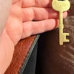 Fossil Elegant Black and Brown Leather Purse Photo 3