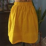 Anthropologie  Odille Drawing Parallels Pleated Pocket Skirt in Marigold Yellow Photo 12