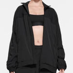 SKIMS  Nylon Oversized Track Jacket Black Size Small Photo 0