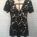The Impeccable Pig Floral Black Lace Romper Photo 0