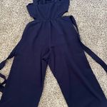 Velvet Torch navy jumpsuit with cutout  size small Photo 5