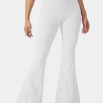 Halara 143H.- Crossover High Waisted Back Pocket Super Flare Leggings. Photo 2