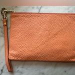 Fossil  Cowhide Leather Wristlet peachy color Photo 0