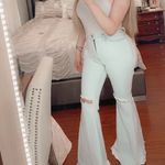 Vibrant  miu light wash bell bottom jeans Photo 7