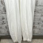 Free People Sienna Smocked Jumpsuit size S, tie back, missing belt, ecru color Photo 9