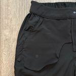 Lululemon Sz 25 Warpstreme High Rise 7/8 Zip Up Button Black Women’s Jogger Pant Photo 13