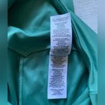 Gymshark Sage Green Leggings with Pockets and Mesh Side Panels in Size S Photo 11