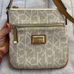 Calvin Klein NWOT monogram crossbody bag. Photo 1