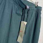 Sweaty Betty NWT Explorer Side Stripe Trousers Women’s Medium Green Photo 11