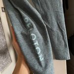 Beyond Yoga x Peloton Heathered Light Blue Caught in the Midi Leggings Photo 2