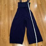 Lulus NWT  perfect moments navy blue smocked tie strapculotte jumpsuit size small Photo 8