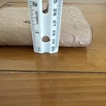 Coach  Medium Corner Zip Wallet Signature Debossed Patent Leather Pink Hue Photo 10