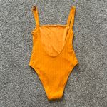 Vitamin A  bright orange low-back one piece swim suit size M NWT Photo 2