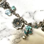 Silver tone blue faux pearl flower charm necklace Photo 2