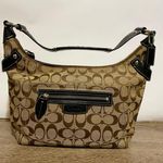 Coach Penelope signature canvas monogram hobo bag Photo 0