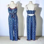 Flying Tomato NWOT Cut Out Floral Jumssuit Photo 1