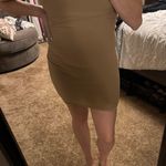 Brown one shoulder body con dress Size M Photo 0