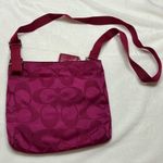 Coach Magenta Signature Logo File Getaway Crossbody Bag Photo 3