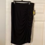 Vince Camuto  size L skirt very soft color black it’s mid length skirt  waist 32” Photo 2