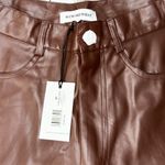 We Wore What Revolve|| VEGAN LEATHER FLARE BELL SHORT| SZ 27 Photo 4