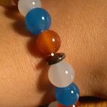 Red, White, and Blue Agate And Hematite Stainless Steel Bracelet Photo 7