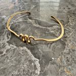 Gold Minimalist Open Cuff Bracelet with Central Accent Photo 1