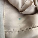 Cute 90s beige cream tan khaki crochet bag with a brown green pink stripes shoulder hand bag purse and buckle detail. Photo 3