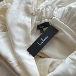 Lulus NWT Lulu’s Elegant Destiny Cream Sleeveless Bow Midi Dress large wedding guest Photo 2