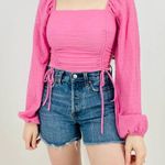 Revolve  Sophie Rue Ruched Longsleeve Cropped Top in Barbie Pink Size S Photo 8