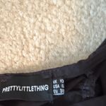 Pretty Little Thing Black Off-Shoulder Top Photo 1