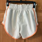 Nike Size Extra Small XS Dri-Fit Women's White and Orange Running Shorts Photo 3